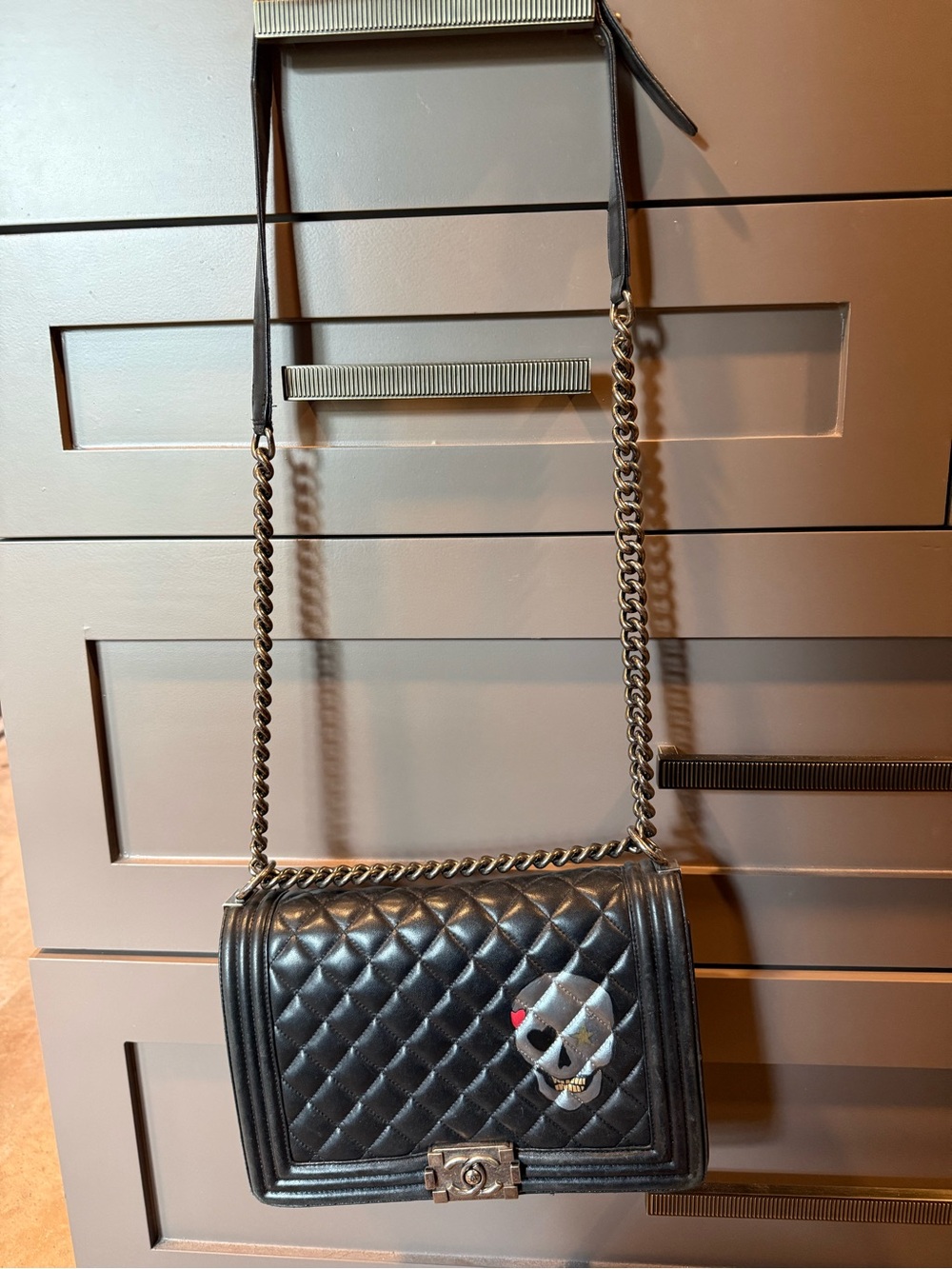 CHANEL Black Quilted Leather Shoulder Bag with Skull Accent